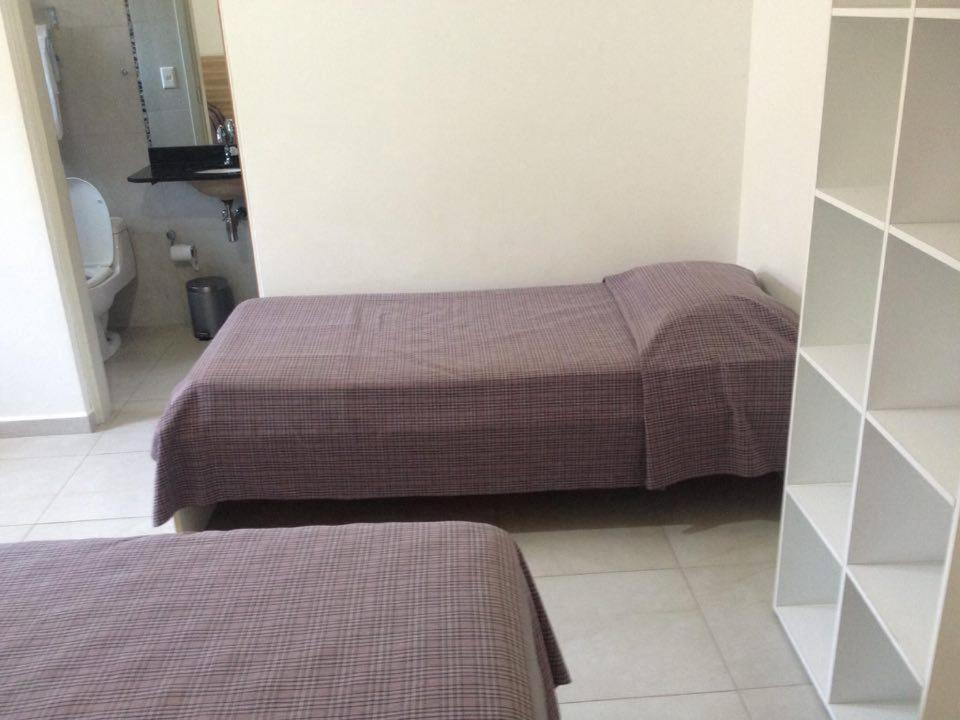 Pousada Parque Suites Estacionamento E Piscina Guarujá Chambre photo