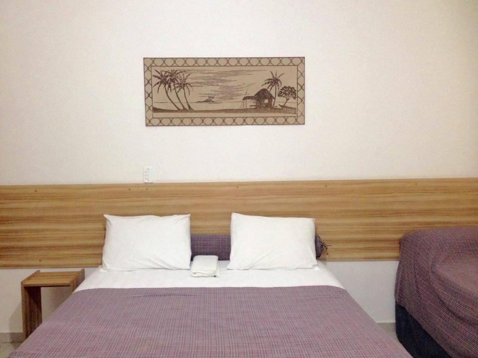 Pousada Parque Suites Estacionamento E Piscina Guarujá Chambre photo